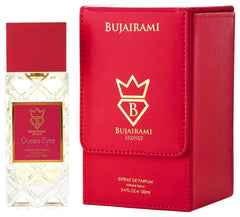 Bujairami Ocean Eyes extrait de parfum bottle next to its red leather box packaging, featuring gold lettering and a crown logo.