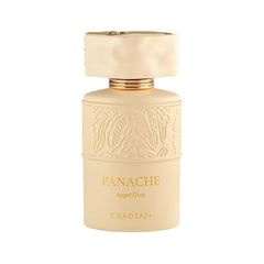 A bottle of KhadlaJ Panache Angel Dust perfume, featuring a matte cream-colored bottle with embossed details and gold lettering, topped with a matching cream cap and gold collar, set against a plain white background.