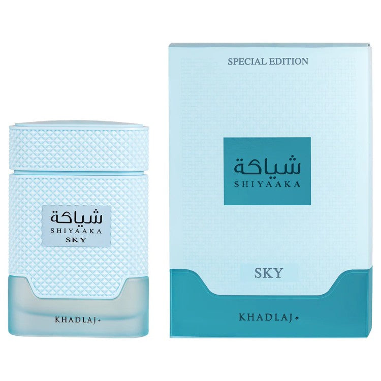Shiya'aka Sky perfume bottle and its packaging box by Khadlaaj, featuring a light blue textured design with a teal accent block.