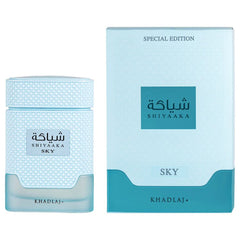 Shiya'aka Sky perfume bottle and its packaging box by Khadlaaj, featuring a light blue textured design with a teal accent block.